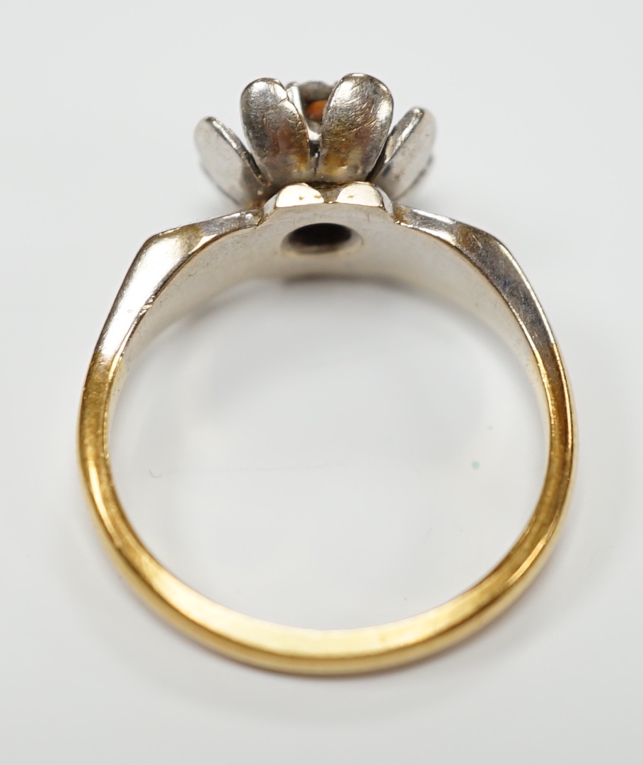 An 18ct gold and illusion set diamond flower head ring, size L, gross weight 4.7 grams.